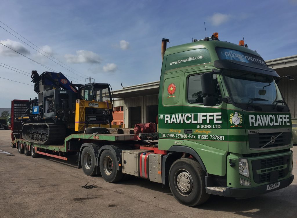 Tracked Machine with Crane on back of JB Rawcliffe & Sons Ltd Truck